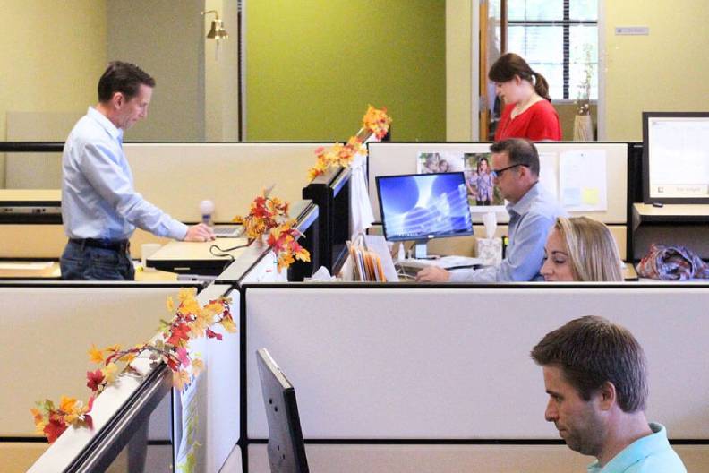 QASource QA Experts In Cubicles - Pop Up